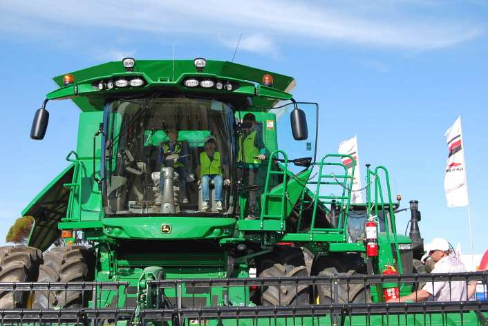 Kids in cab of
          aggie machine